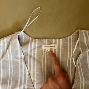 Beige striped tie front dress.